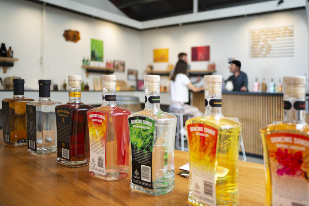 Bottles of spirits lined up on bar