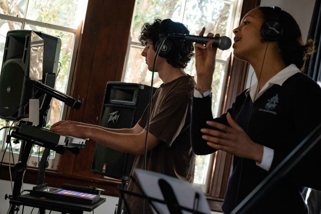 2 people in recording studio